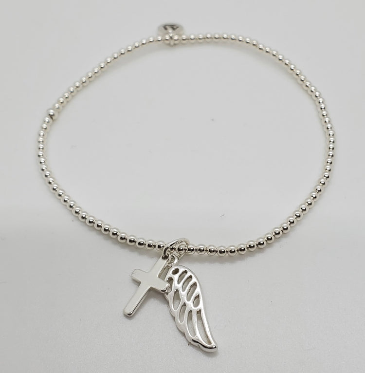 Stretch Bracelet with Cross and Wing Charm